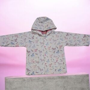 Powell Craft raincoat with rainbow unicorn pattern. Unicorn Print Hooded Jacket